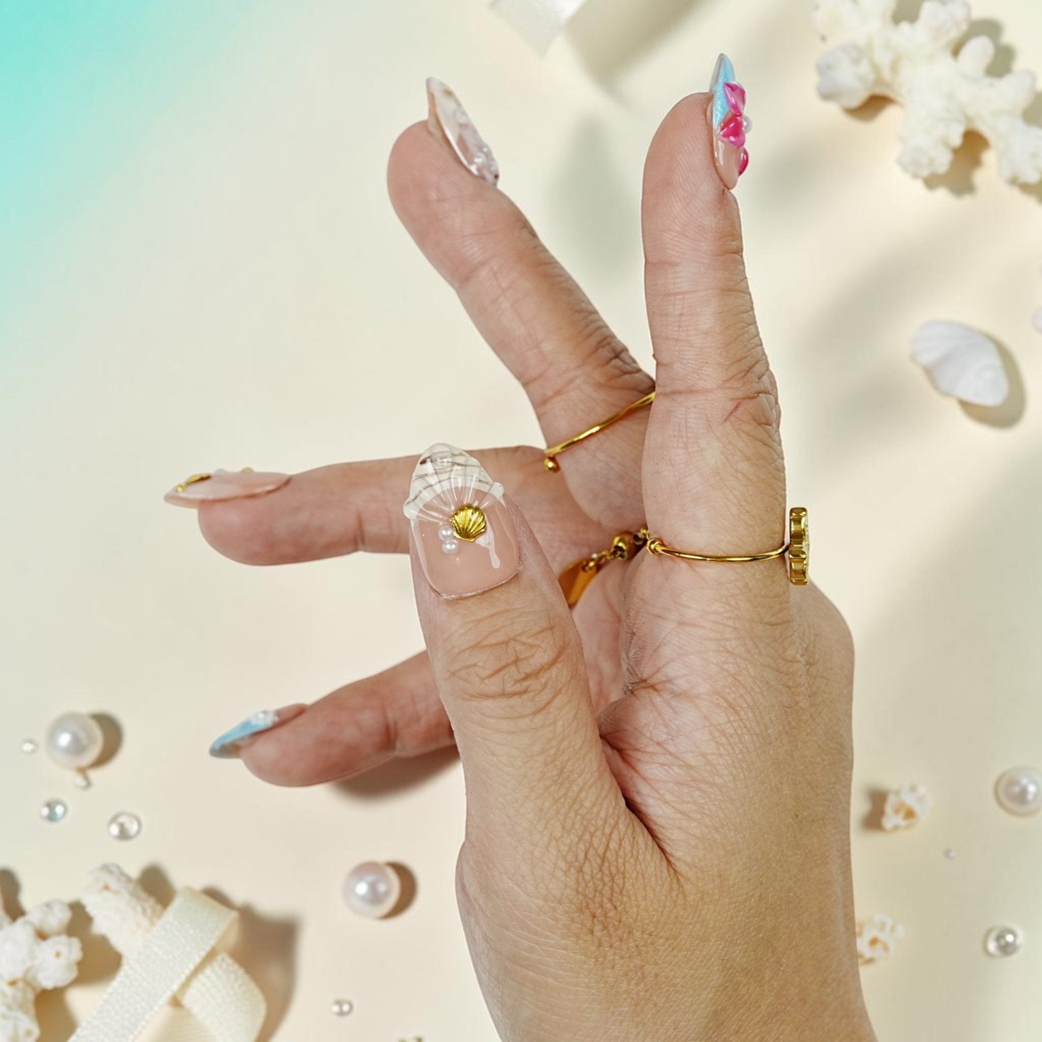 DSC00065 tropical press on nails with a 3D scallop shell, gold charm and ocean foam tip