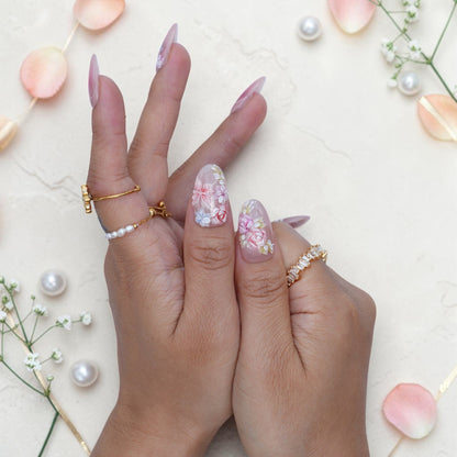 Bridal watercolour press on nails with painted roses, blue blossoms and a pearly base