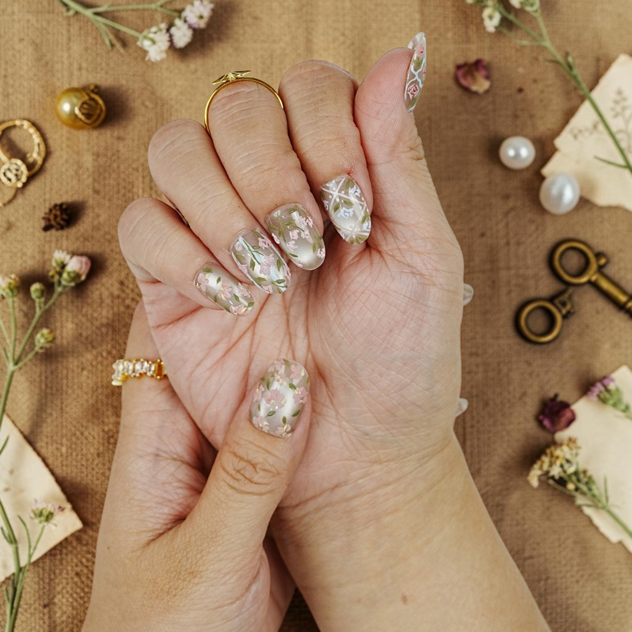 DSC00074 hand painted wildflower press on nails on a dried flower flat lay