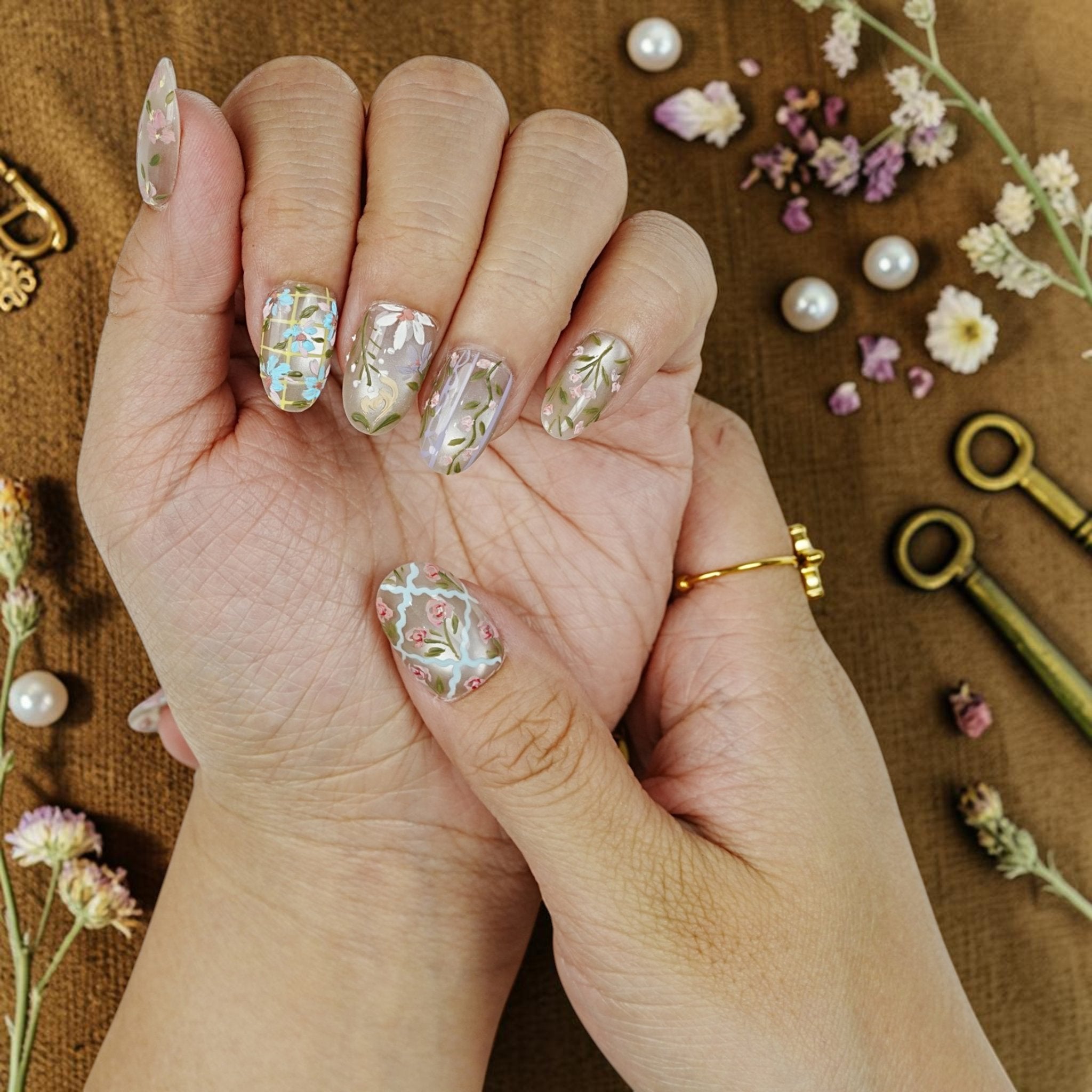 DSC00075 close up of painted wildflowers and lattice on milky press on nails