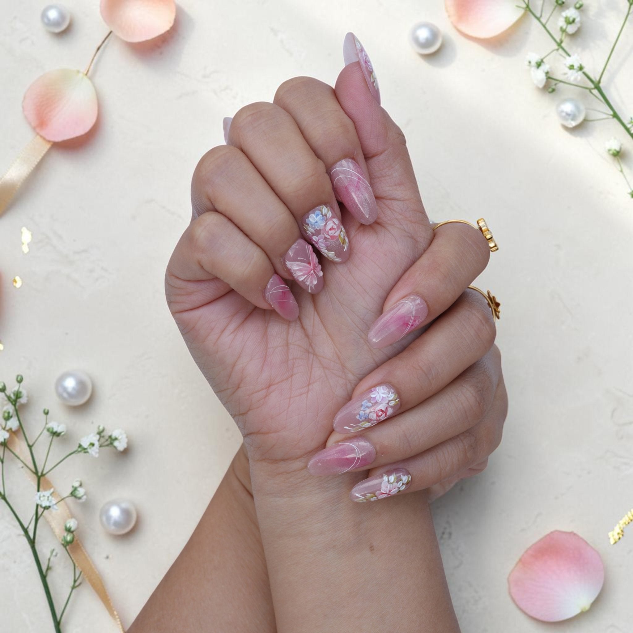 Blushing Bride watercolour press on nails set on both hands in blush pink florals