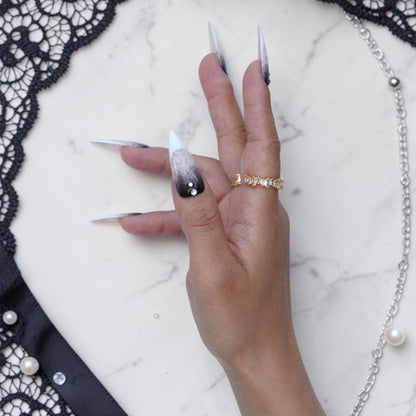 Black Veil lace press on nails with pointed white tips and lace detail