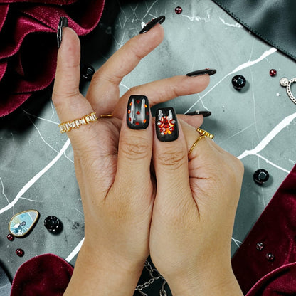 DSC00089 black cat eye gothic press on nails with red heart confetti and gems