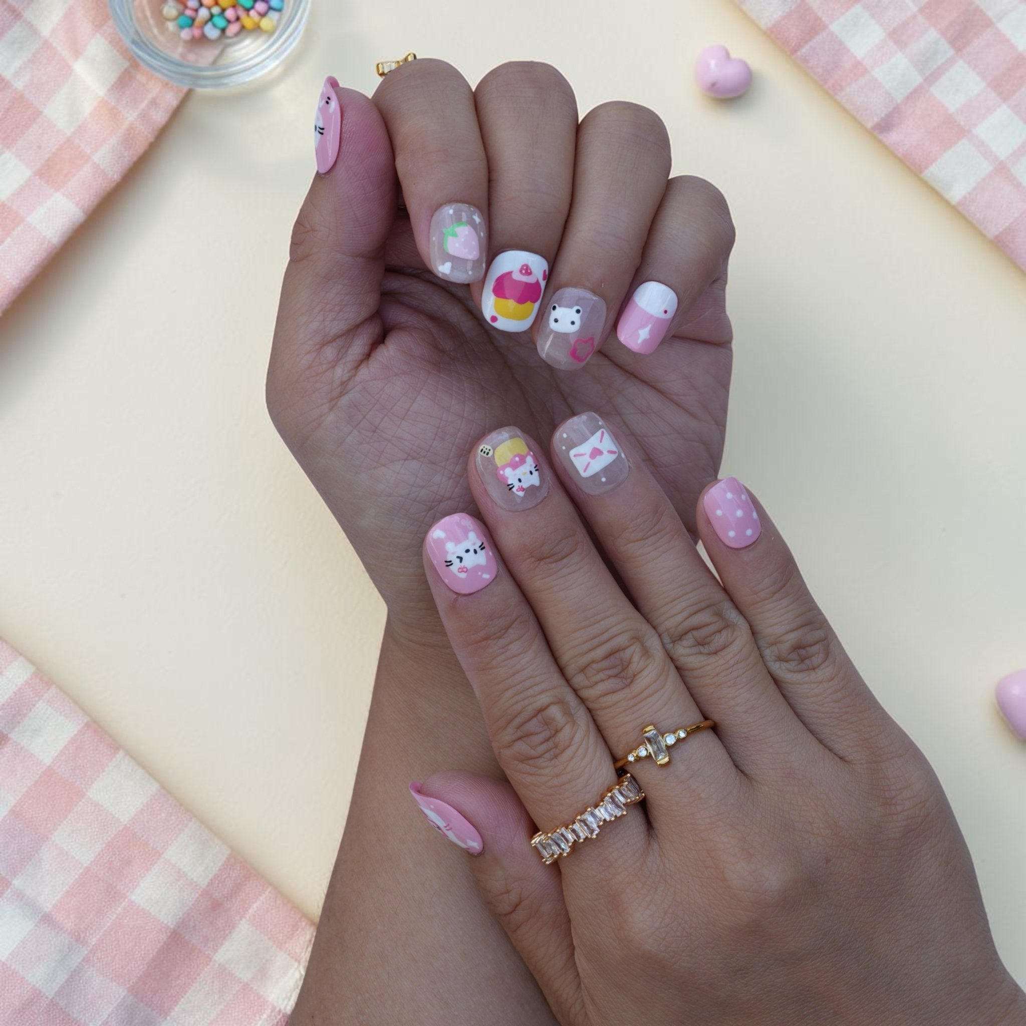 Kawaii cute cat press on nails close up with white kitten, envelope and bow