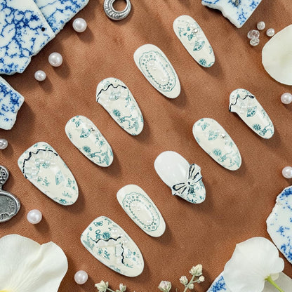 DSC00092 porcelain press on nails full set in blue and white toile with pearls bows and 3D lace laid flat
