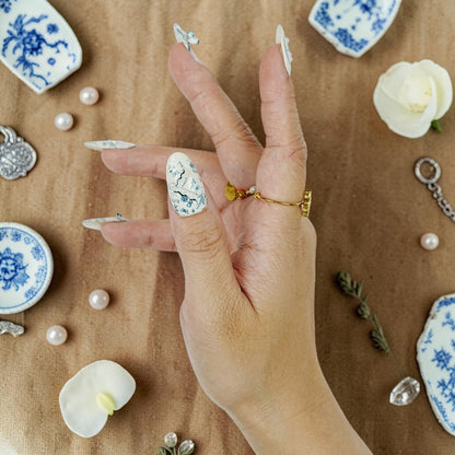 DSC00098 close up of blue toile florals and 3D pearls on porcelain press on nails