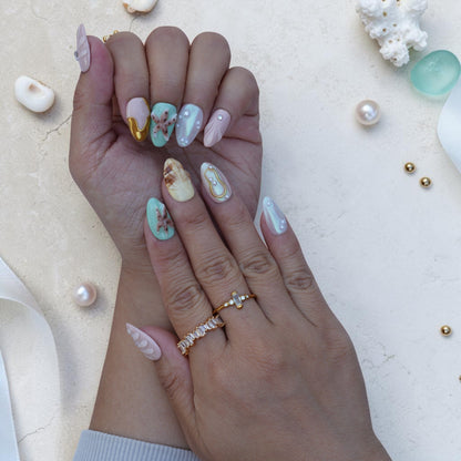 Tide Pool press on nails close up with starfish, seashell and pearl accents
