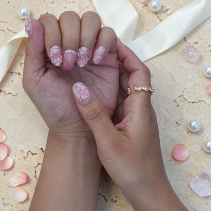 Short oval cherry blossom press on nails with pearl rows and pink gradient tips
