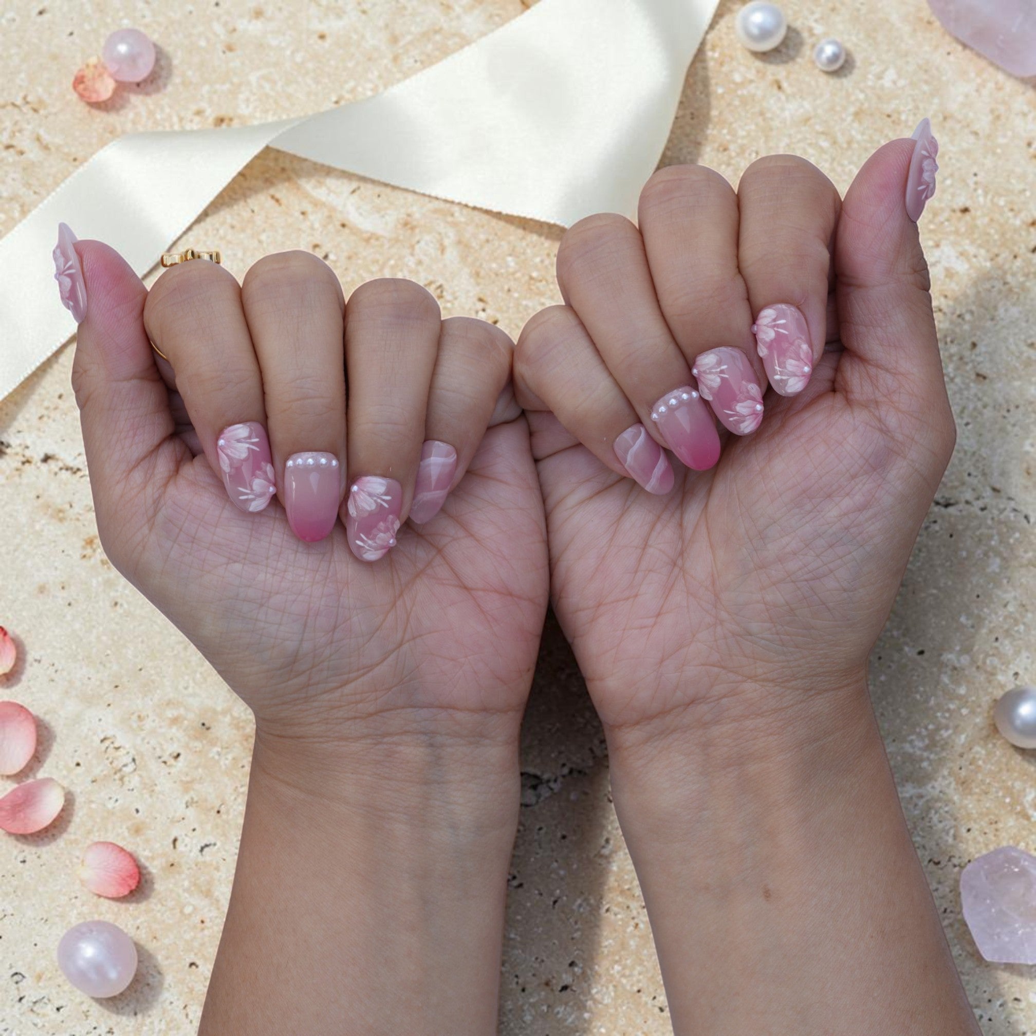 Hanami Bloom cherry blossom press on nails set on both hands in soft pink with pearls