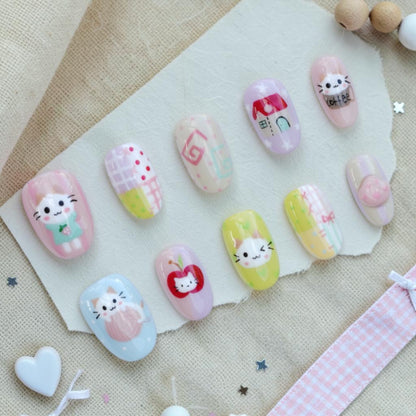 Kitty Cafe kawaii press on nails full set in pastel colours with cute cat art