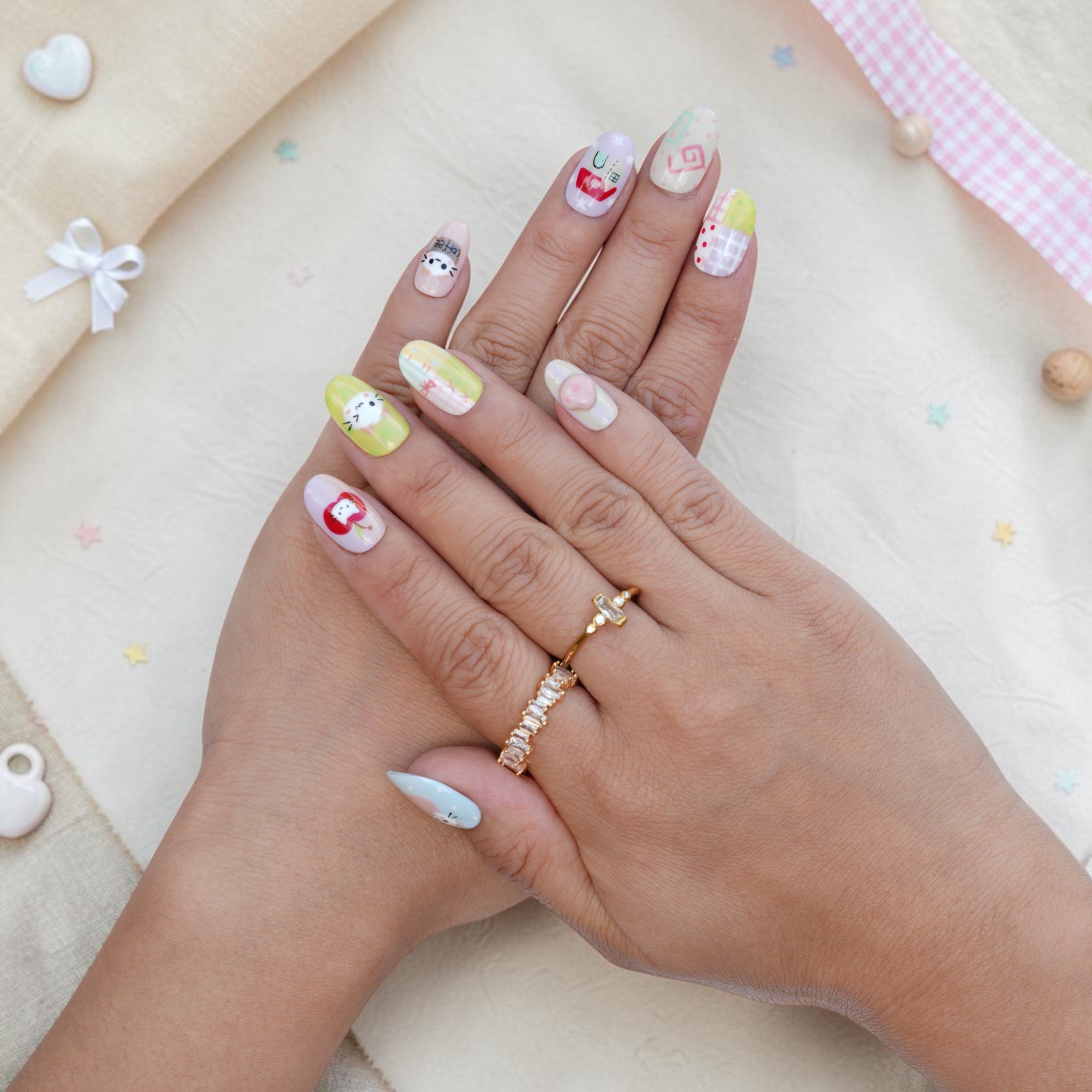 Pastel press on nails with cute cat faces and gingham patterns