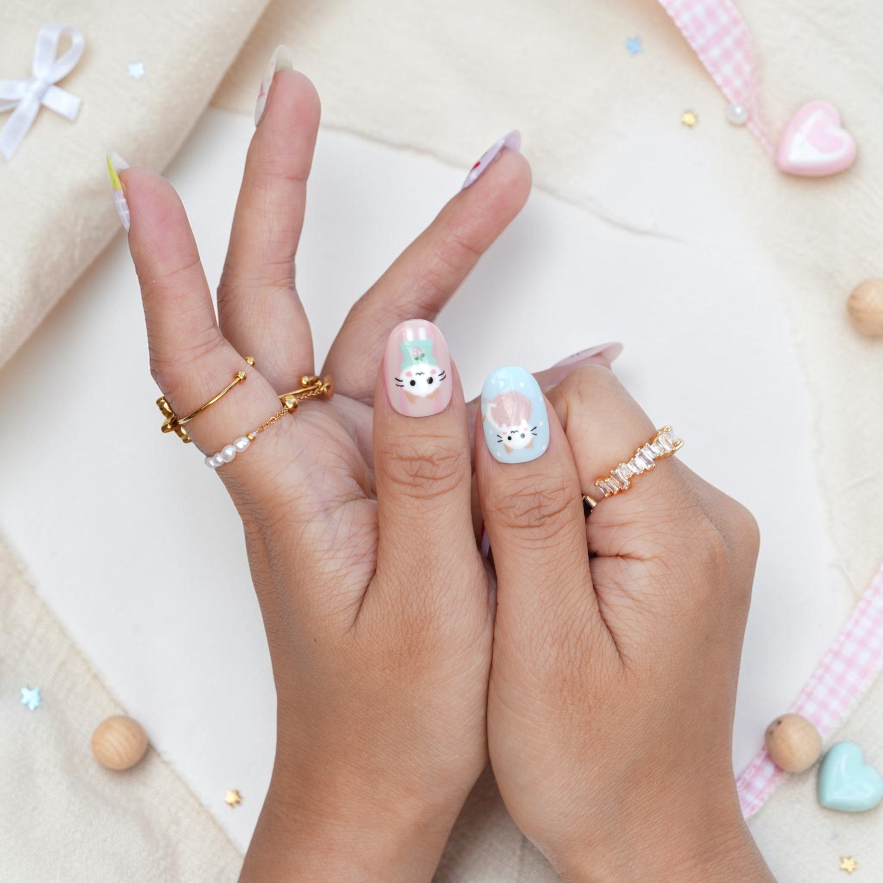 Blue press on nail with a cute hand painted kitten