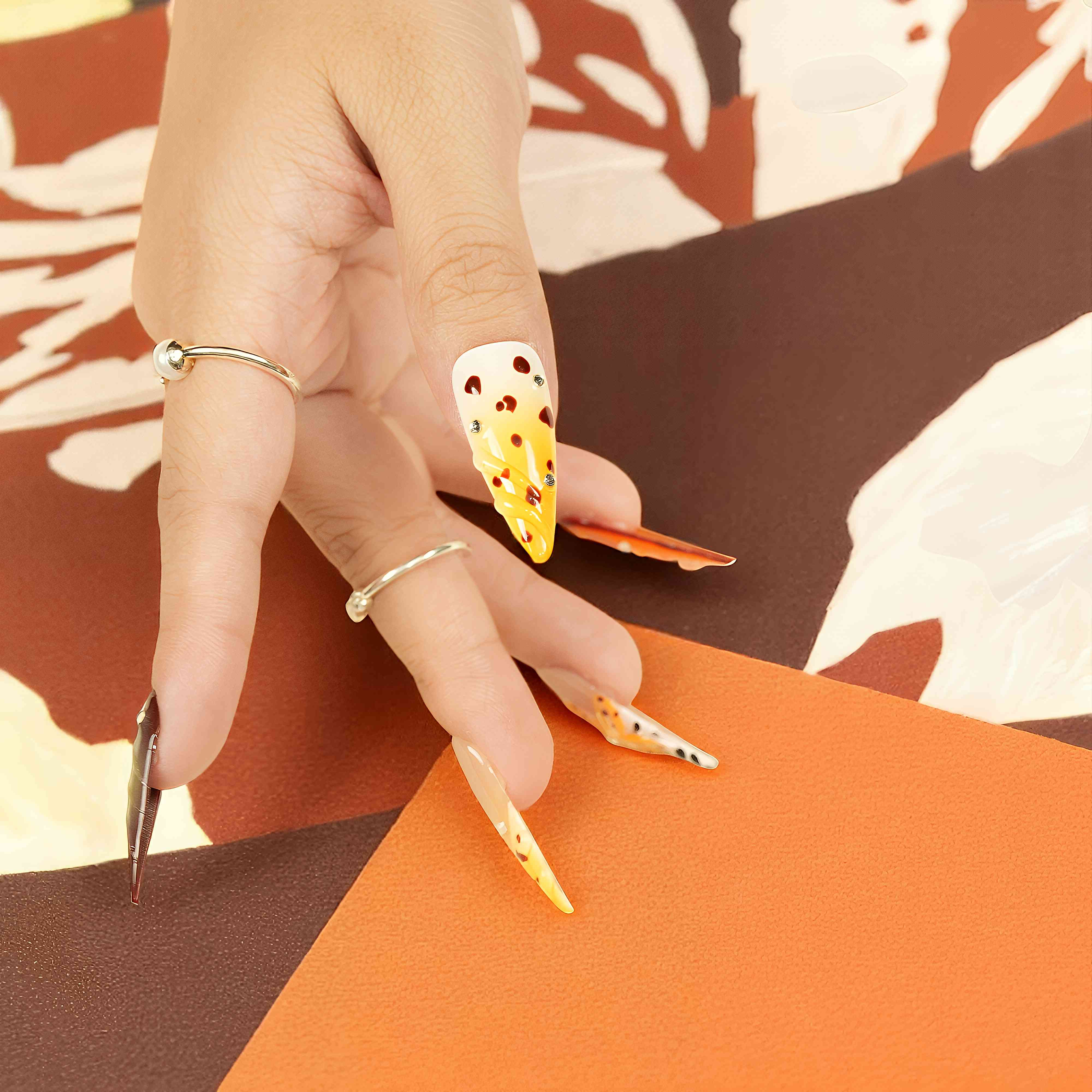 side angle view of australian press on nails with heart and 3D elements