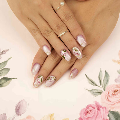 Rose-themed press on nails featuring gold accents, cat’s eye effect, and soft floral elegance
