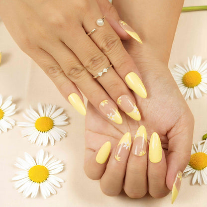 Cute flower press on nails Australia with soft yellow tones.