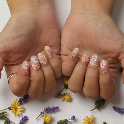 Reusable press on nails with nude base and 3D pastel floral detailing