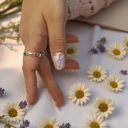 Short oval false nails with multicolour hand-painted flowers and butterfly wings