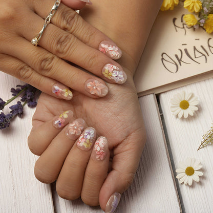 Reusable glue on nails with spring-inspired design and delicate butterfly effects