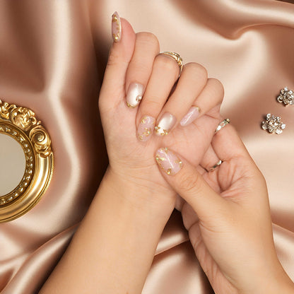 Golden Petal Veil floral nails with glimmer and handmade artistry