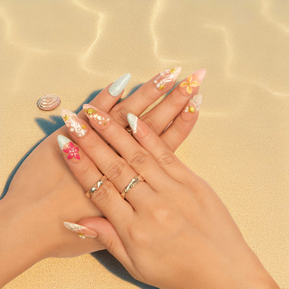 Coastal nail press on nails with pearl accents and swirl textures