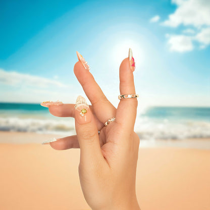 Ocean-inspired press on nails with pastel base, pearls, and flowers