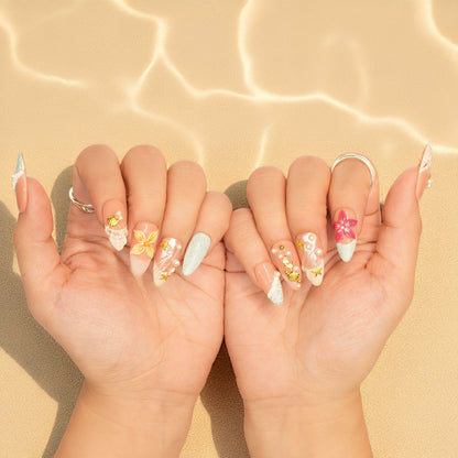Floral and seashell press on nails with beach-inspired colors