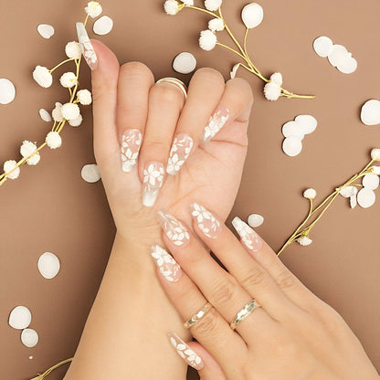 Australian handmade press on nails with white flowers and nude pink undertone in coffin shape