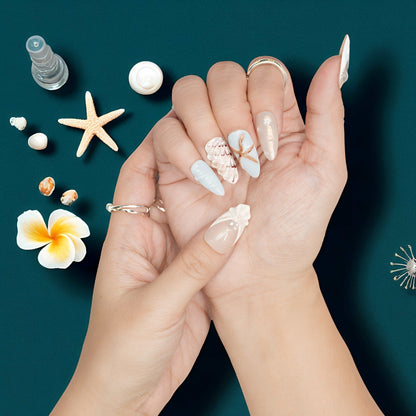 Pastel seafoam green jelly nails with sculpted white flower and shimmer