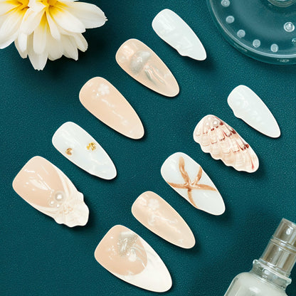 Soft pastel jelly nail set with ocean charms and pearl finish