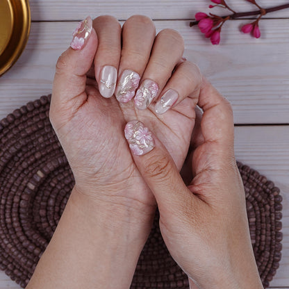 Pearlescent finish press on nails with spring-inspired cherry blossom details