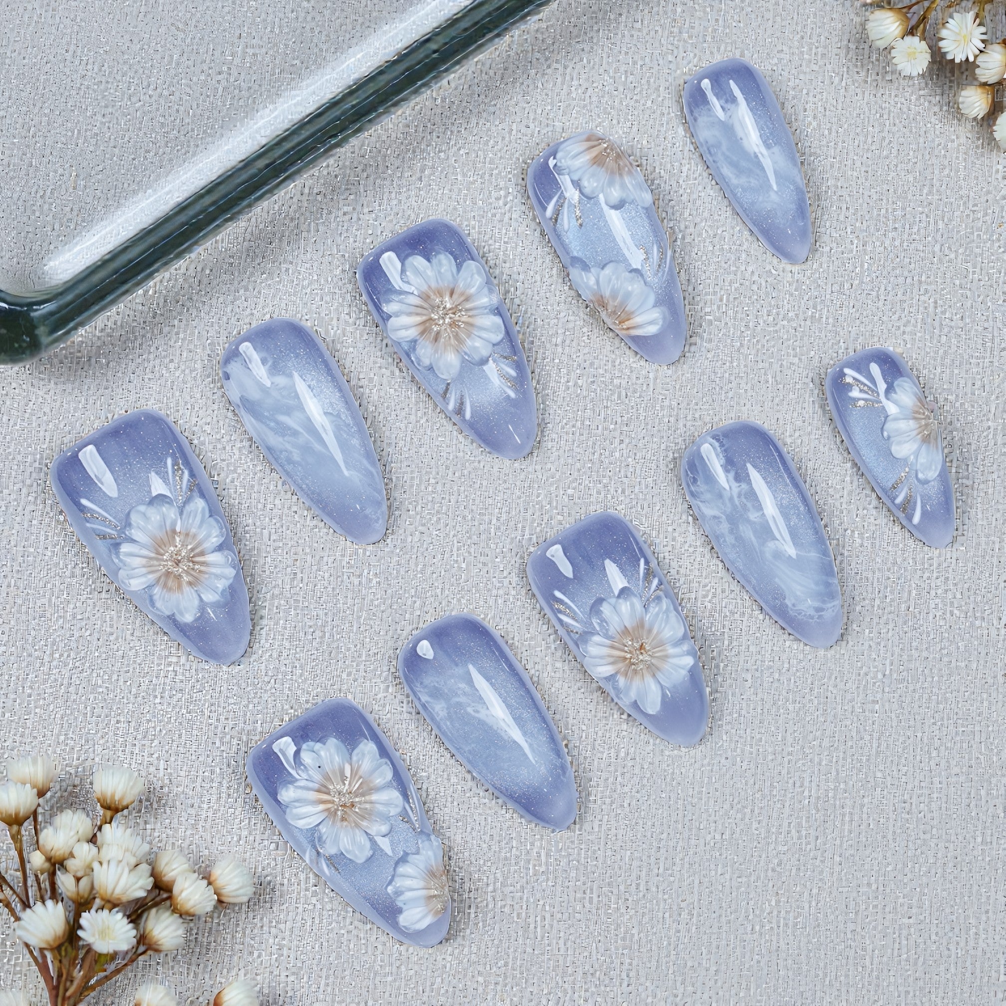 Purple handmade press on nails with white daisy floral design on fabric, Dress For Nails